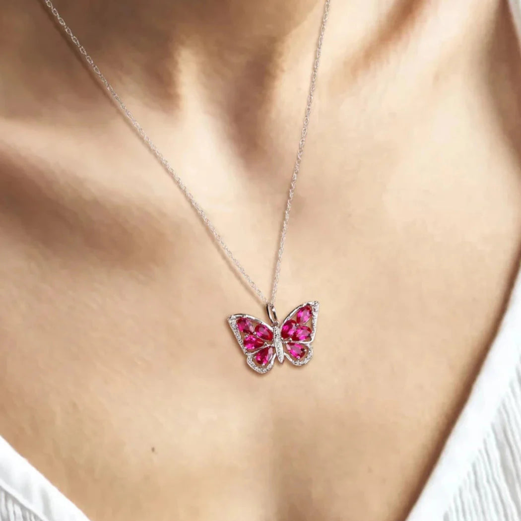 1.9 Ct Pear-cut Blue Topaz Gemstone Butterfly Pendant Necklace