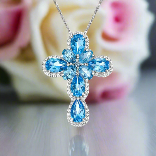Pear-cut Swiss Blue Halo Cross Necklace